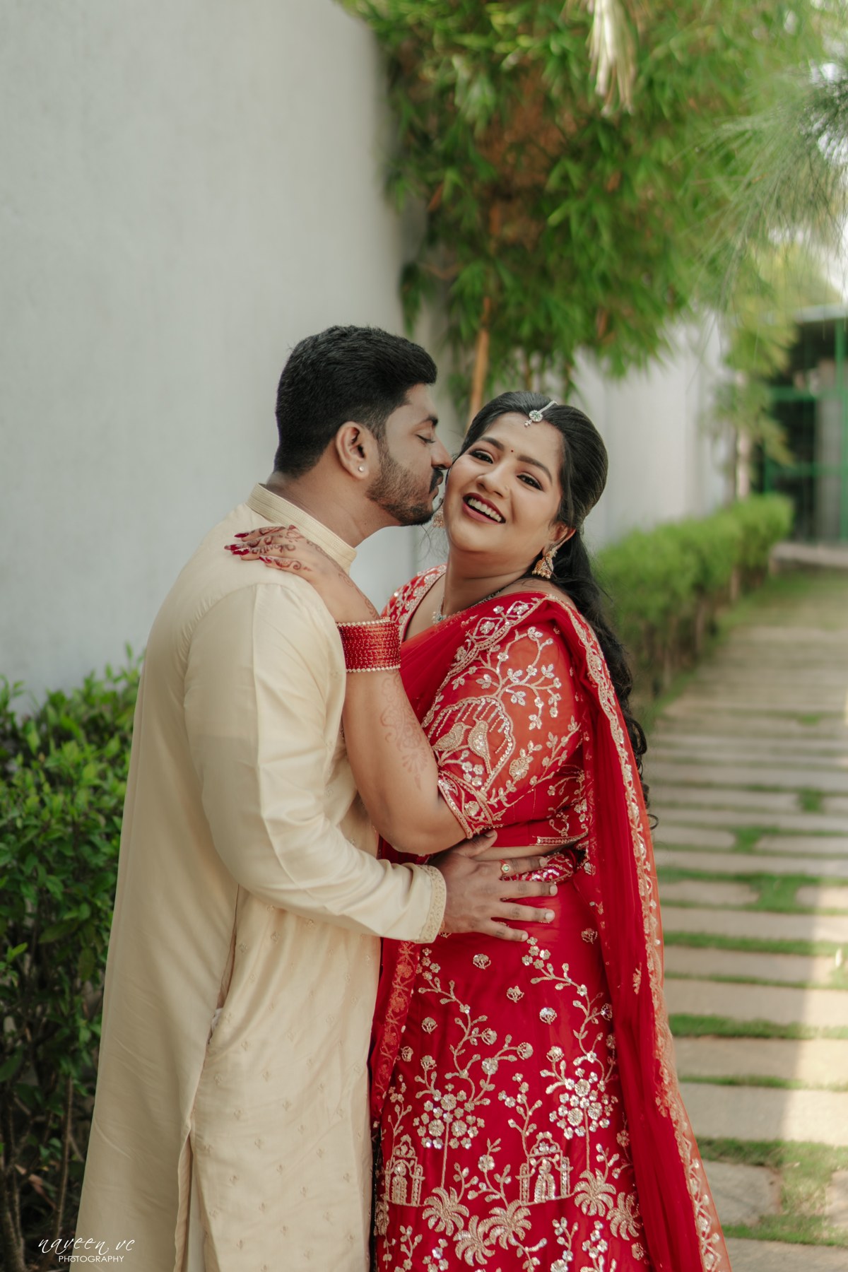 Prajeeth kissing Likitha on the cheek